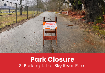 Image of park closed for potential flooding sign.